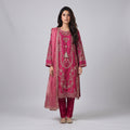 Woman wearing a pink embroidered traditional outfit on a white background