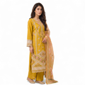 Woman wearing a yellow embroidered traditional outfit with a dupatta on a white background